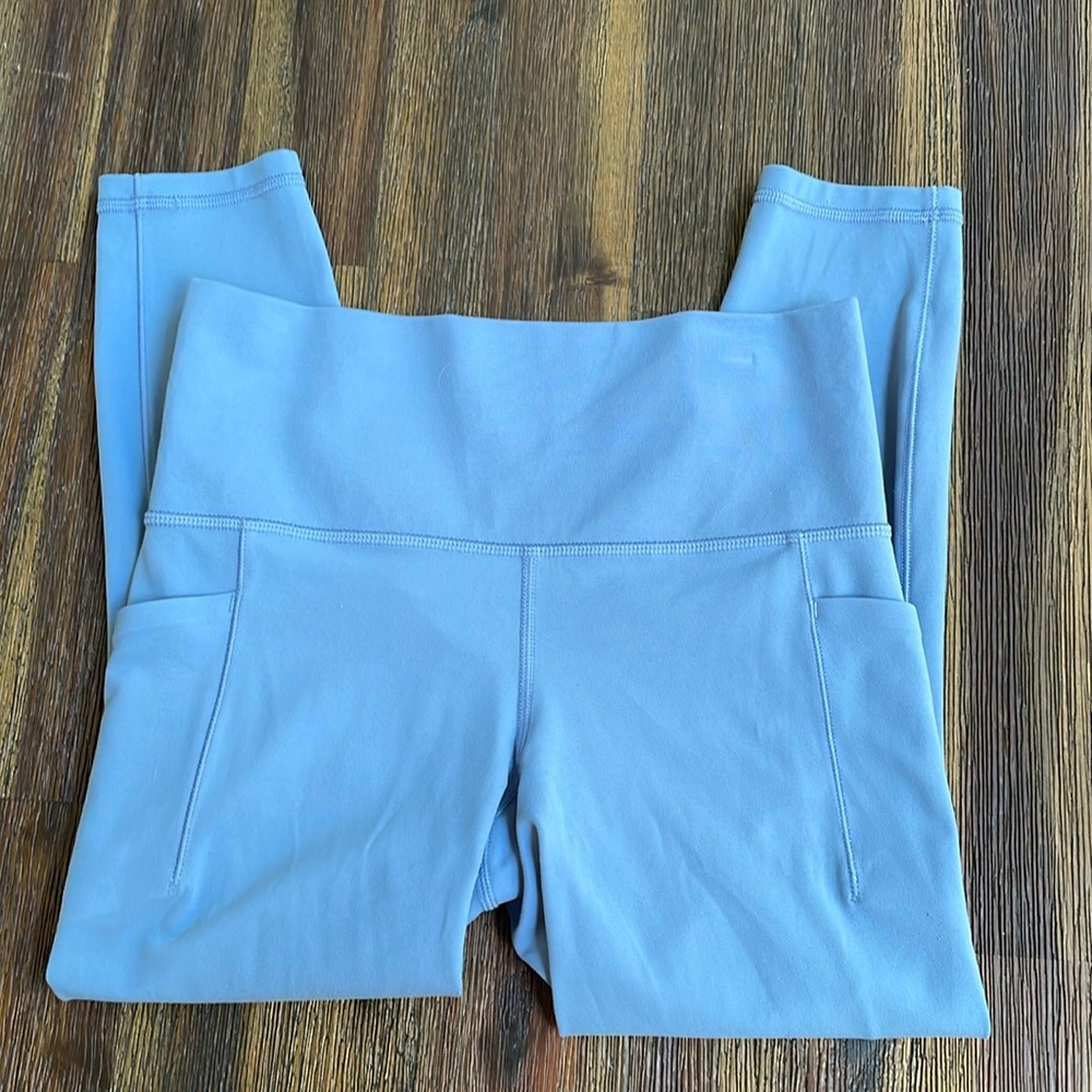 Athleta Salutation Stash Pocket Tight 7/8 in Powervita
